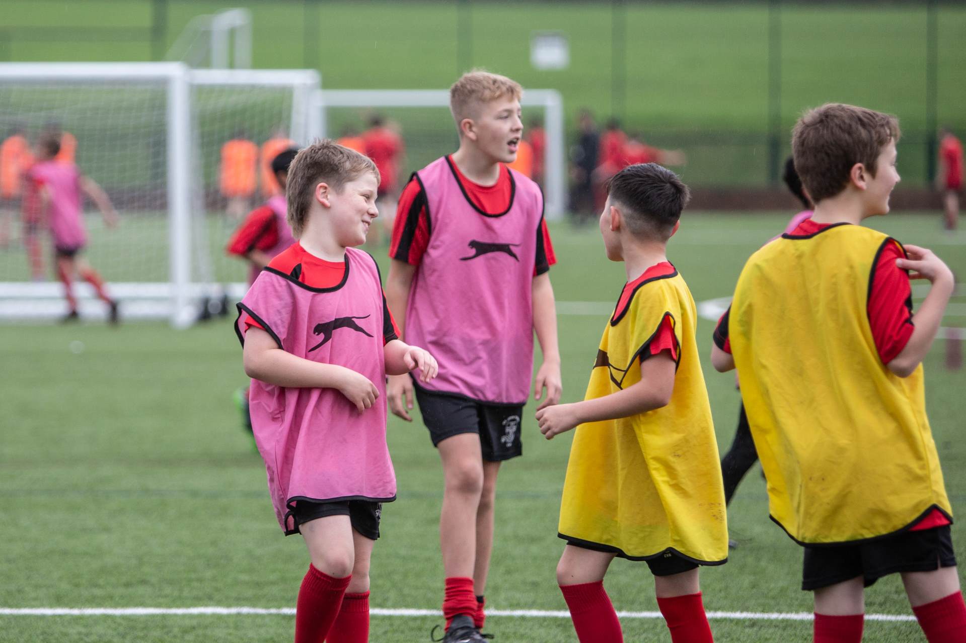 Students enjoying football